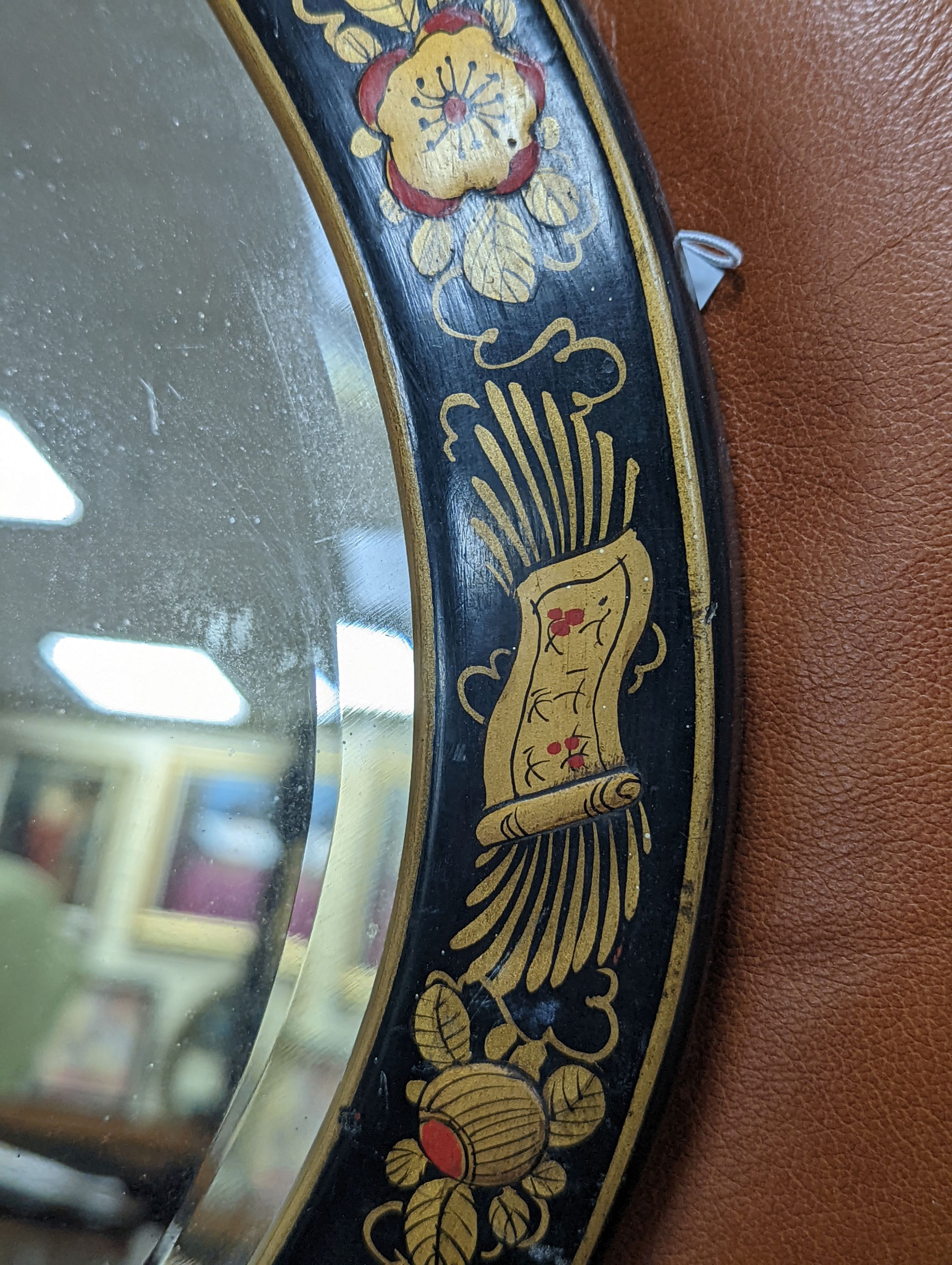 A 1920's oval chinoiserie lacquer wall mirror, width 67cm, height 46cm - To be sold on behalf of The Ukraine Appeal